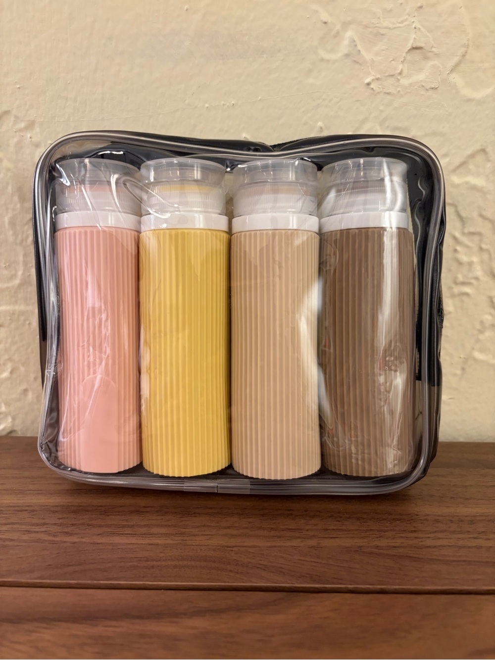 4 Pack 3.4 oz Silicone Travel Bottles Leakproof Squeeze Toiletry Set with Bag